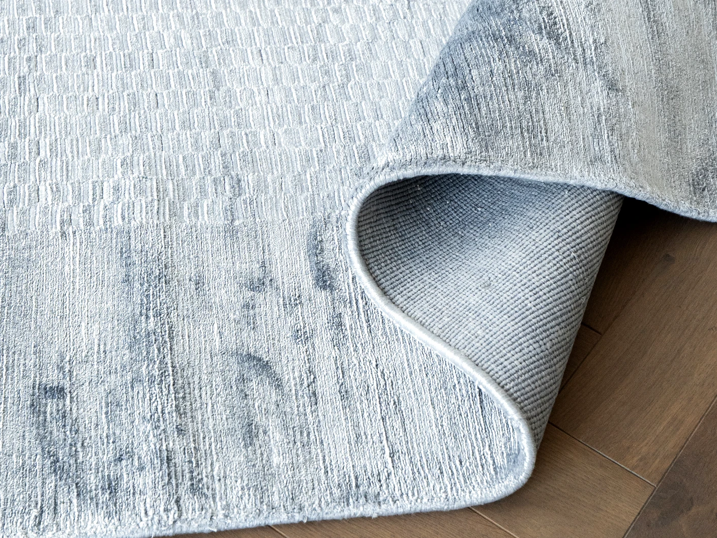 Luna Sky carpets in sky and blue, shown in a product close-up view