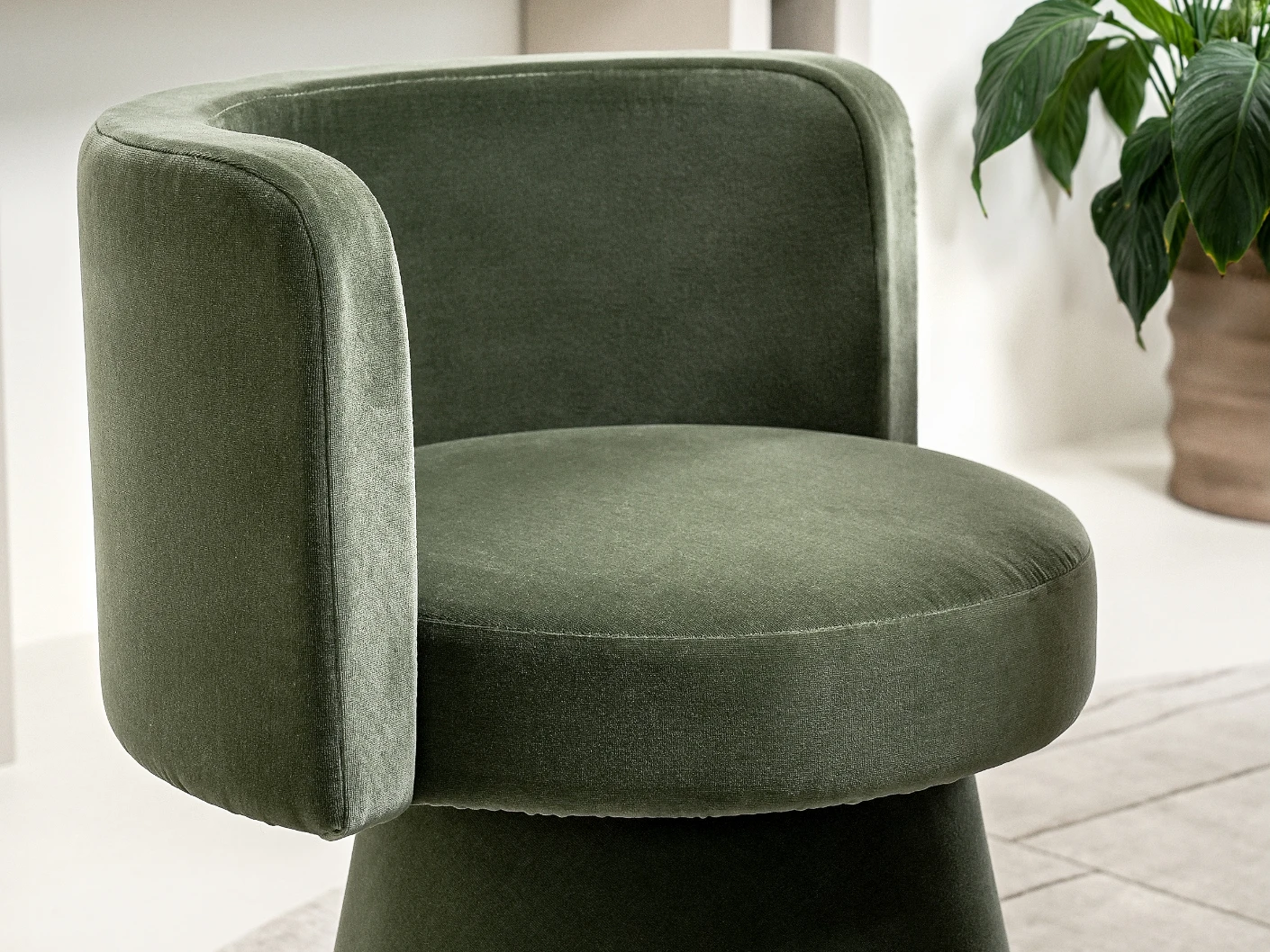 Mara Accent Swivel Chair in forest green, shown in a lifestyle left view as image 4