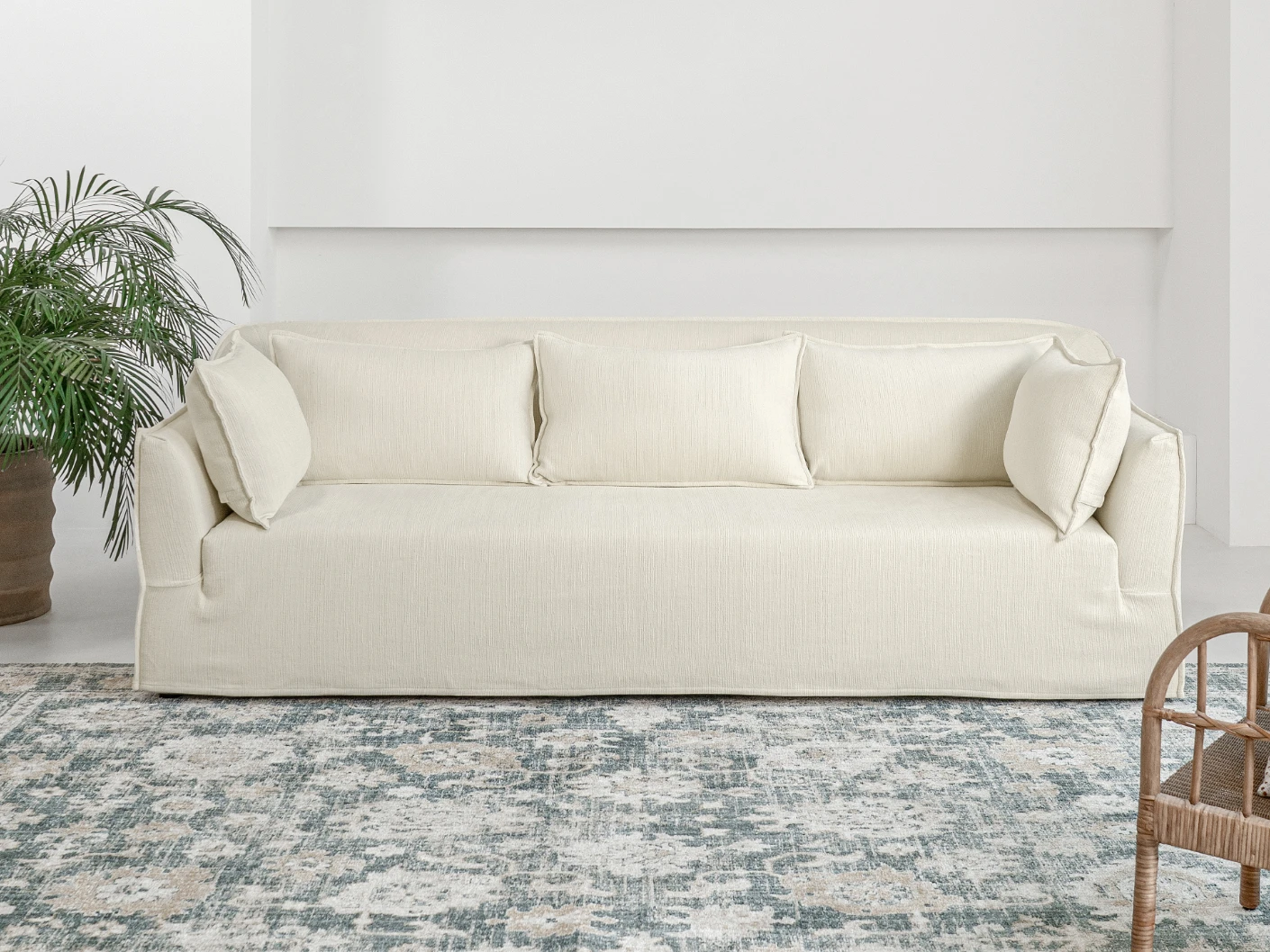 Miro Warm Ivory sofa in ivory, shown in a lifestyle front view