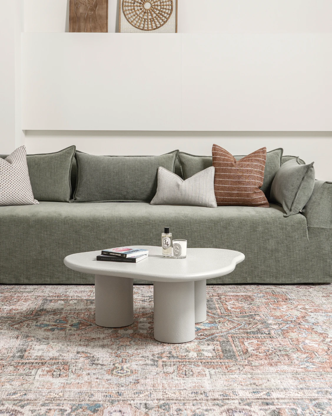 Pienza coffee table in soft ivory and stone, shown in a lifestyle front view as image 2