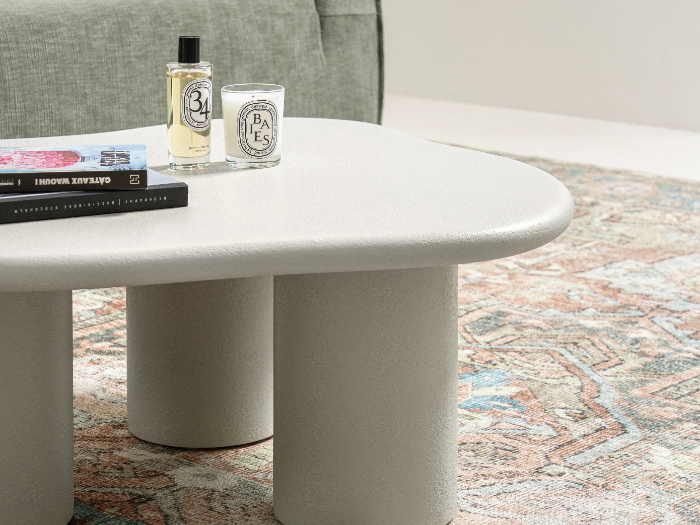 Pienza coffee table in soft ivory and stone, shown in a lifestyle left view as image 3