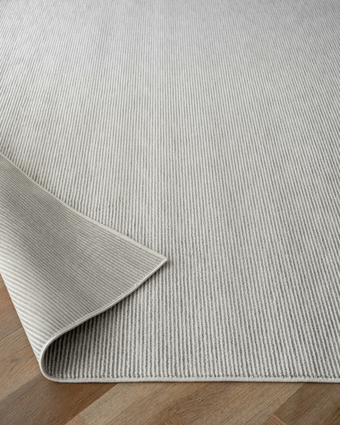 Rik Dune carpet in grey, shown in a product close-up as image 9