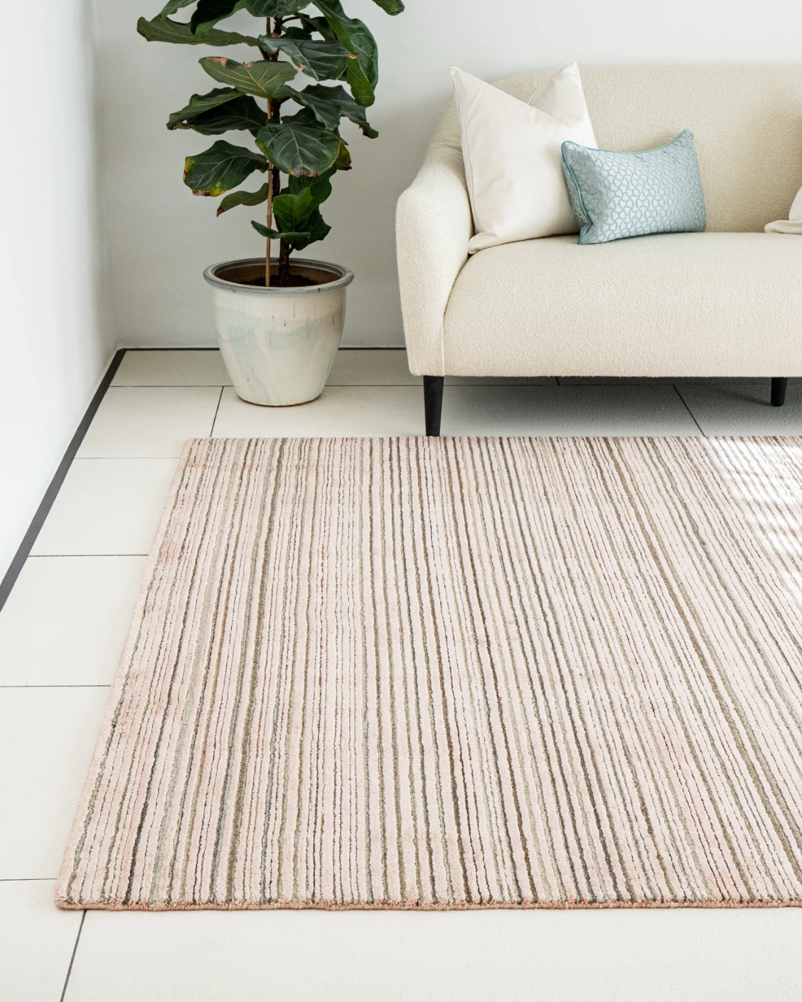 Rita Rosso carpets in pink, shown in a lifestyle front view as image 1