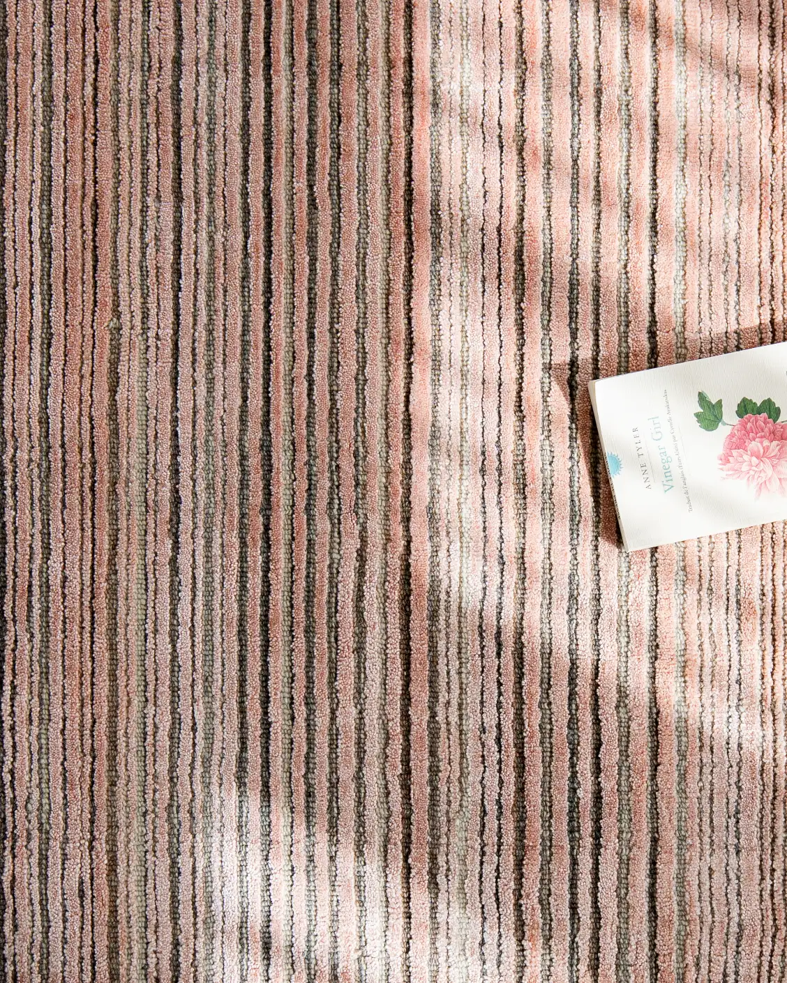 Rita Rosso carpet in pink, shown in a lifestyle top view as image 7