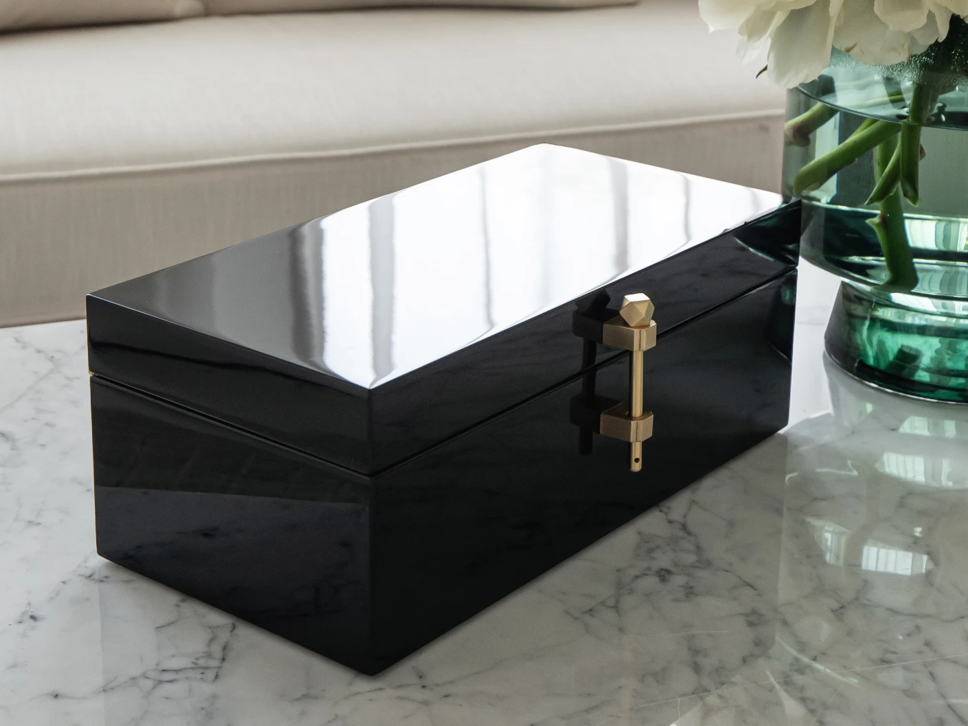 Romare Cornell accessory in black, shown in a lifestyle left view
