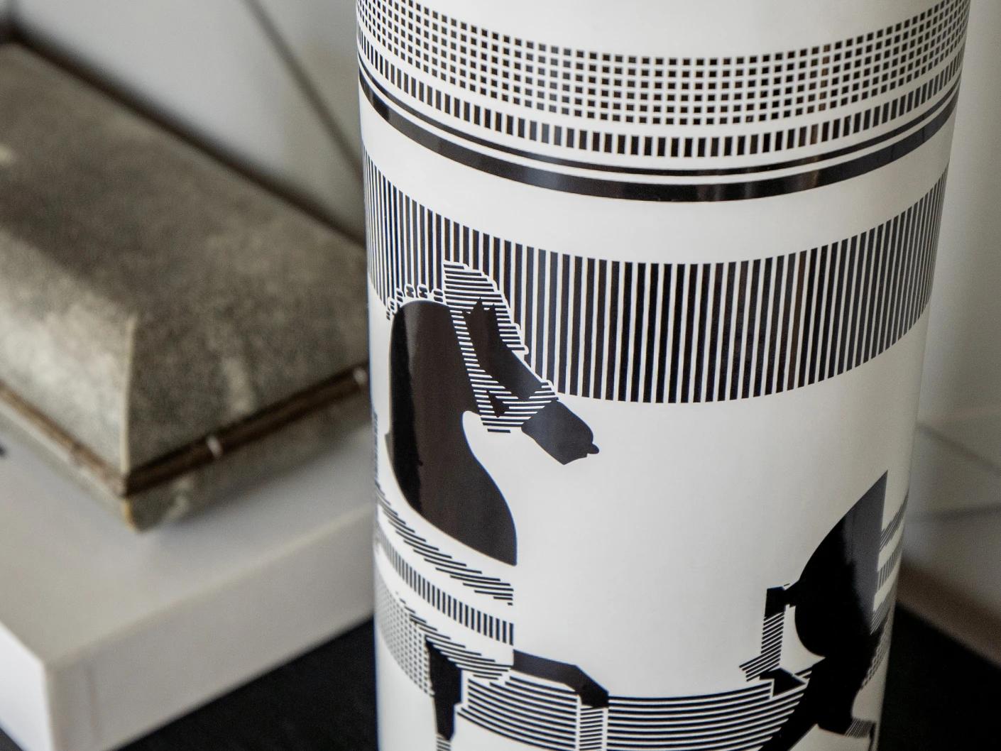 Aurora Arneson vases in white and black, shown in a lifestyle close-up as image 4
