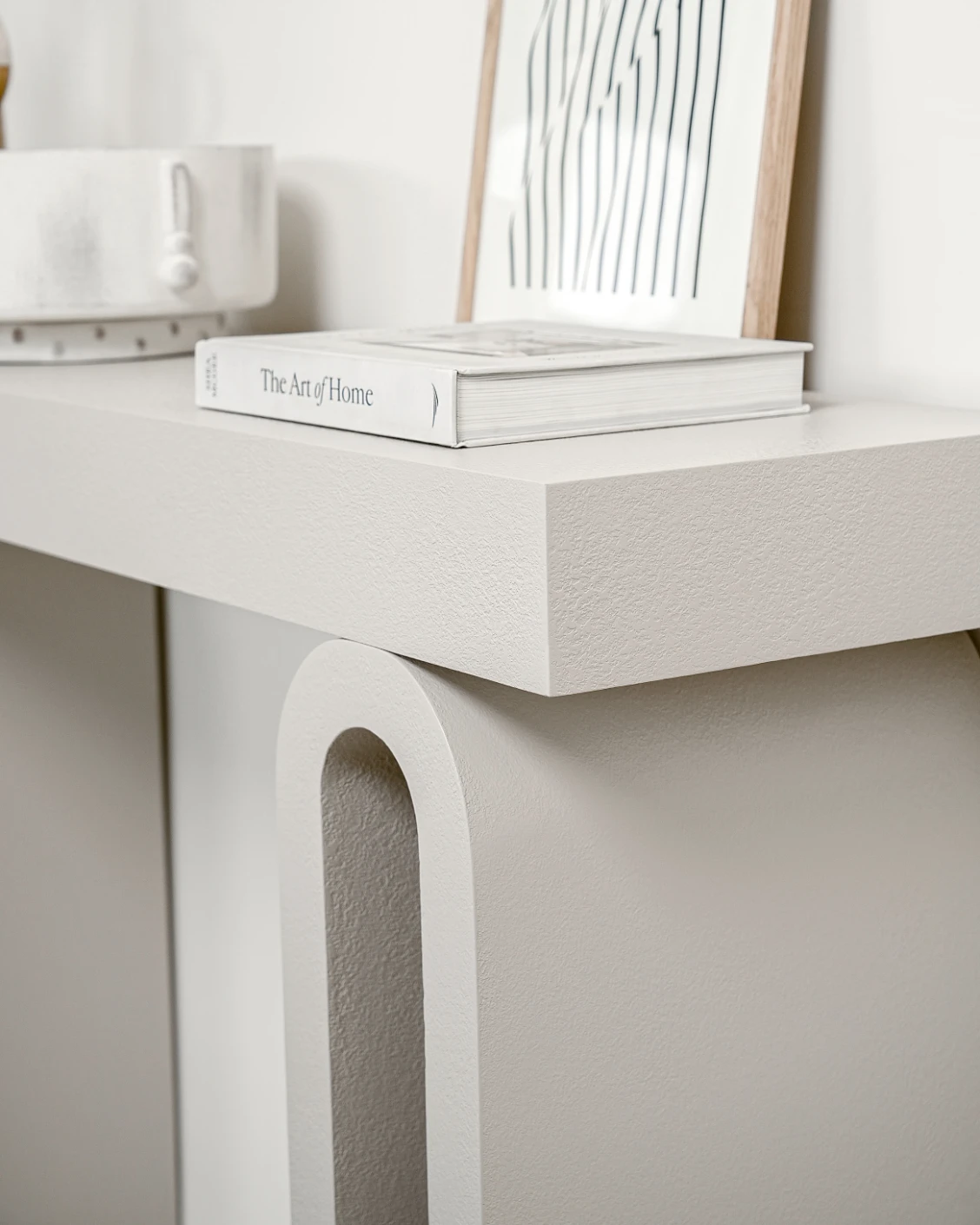 Trento Console Table Soft Ivory Stone console table in soft ivory and stone, shown in a lifestyle right view as image 6