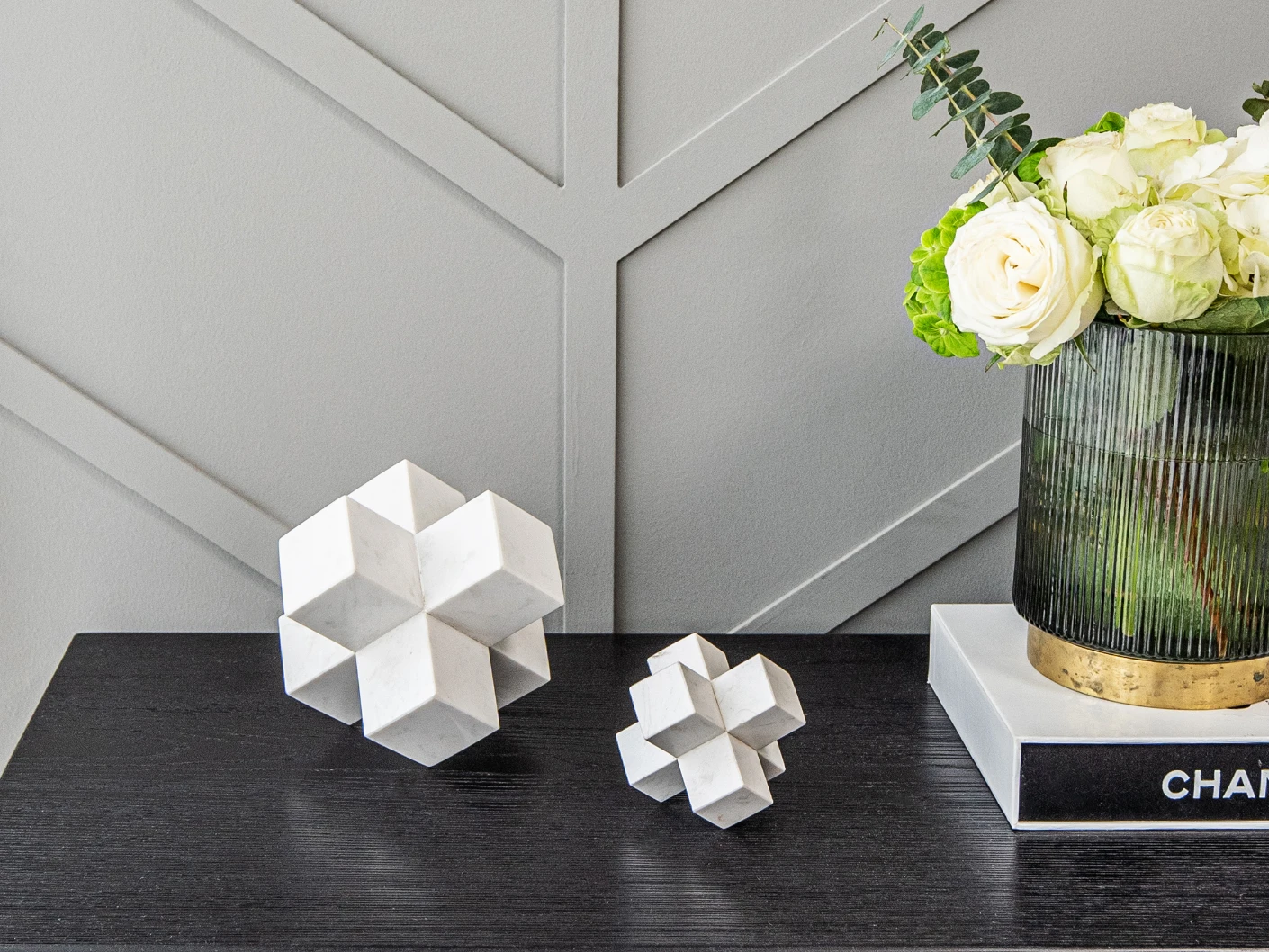 Turing Ellis statues and sculptures in white, shown in a lifestyle front view