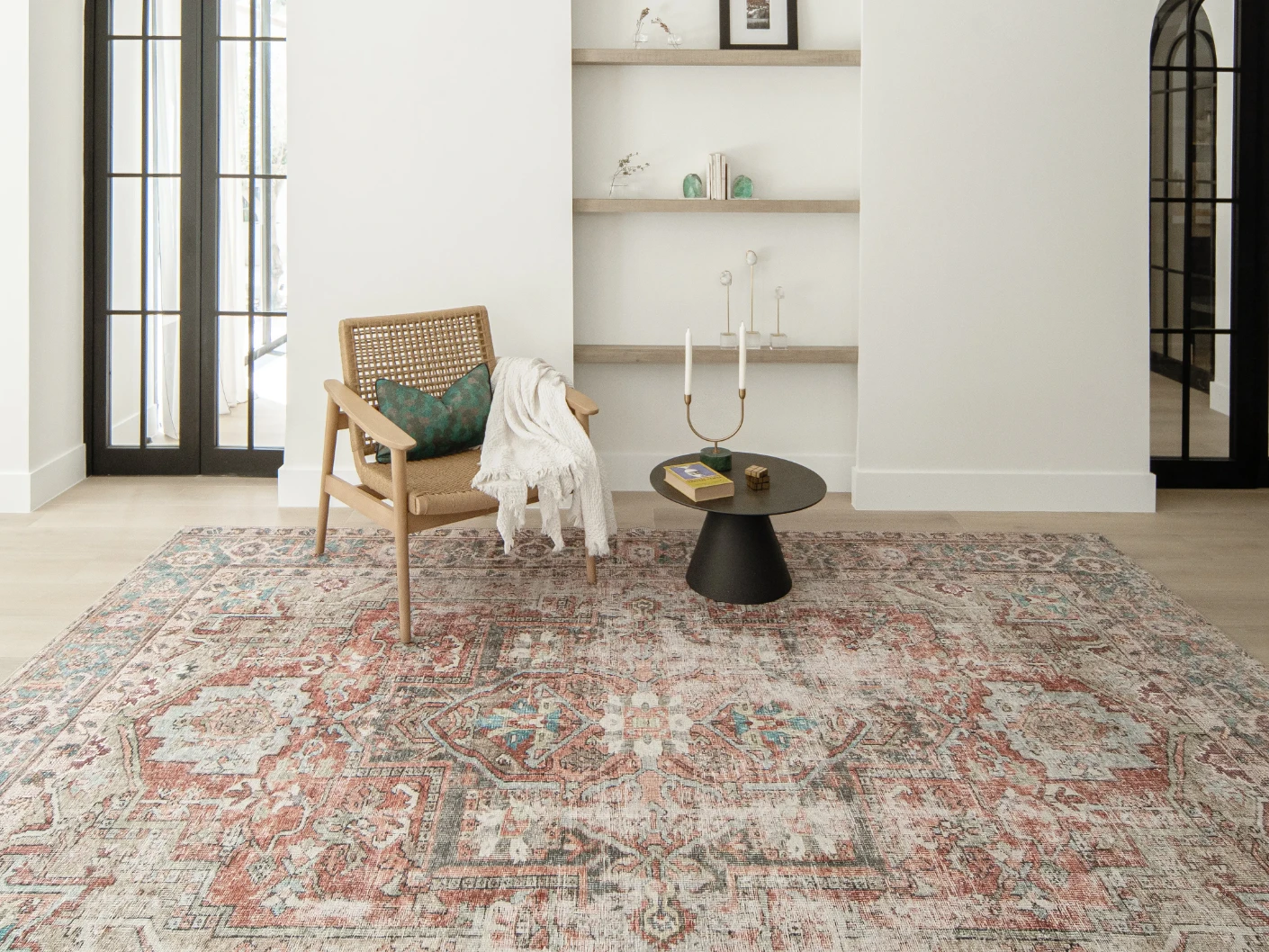 Vince Rouge carpet in red and multicolour, shown in a lifestyle front view