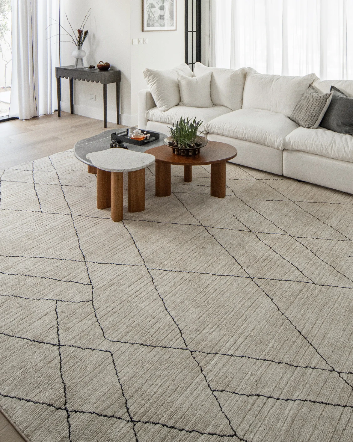 Zen Pearl carpet in charcoal and ivory, shown in a lifestyle right view as image 9