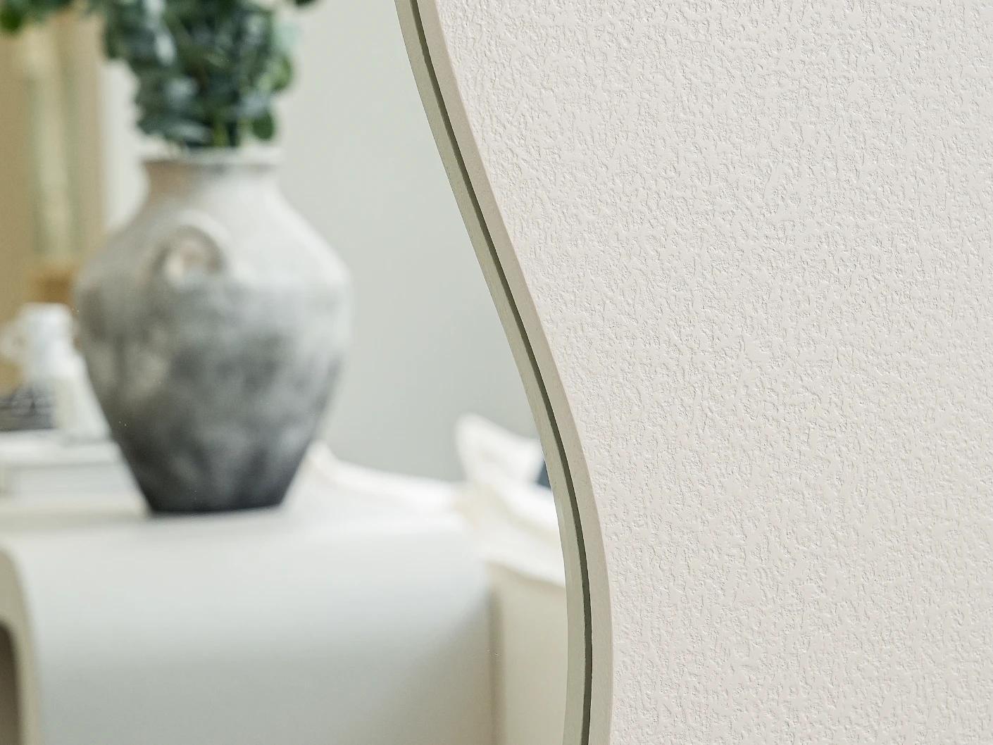 Ivrea mirror in soft ivory and stone, shown in a lifestyle front view as image 5