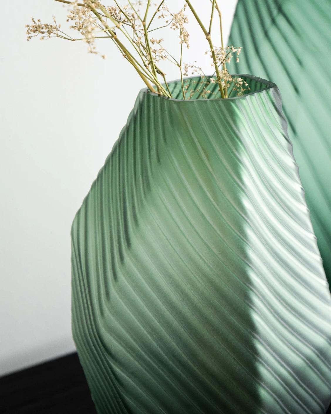 Keira Bundle vases in green, shown in a lifestyle close-up as image 4