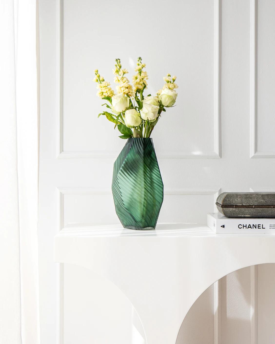 Keira Storms II vases in green, shown in a lifestyle front view as image 4