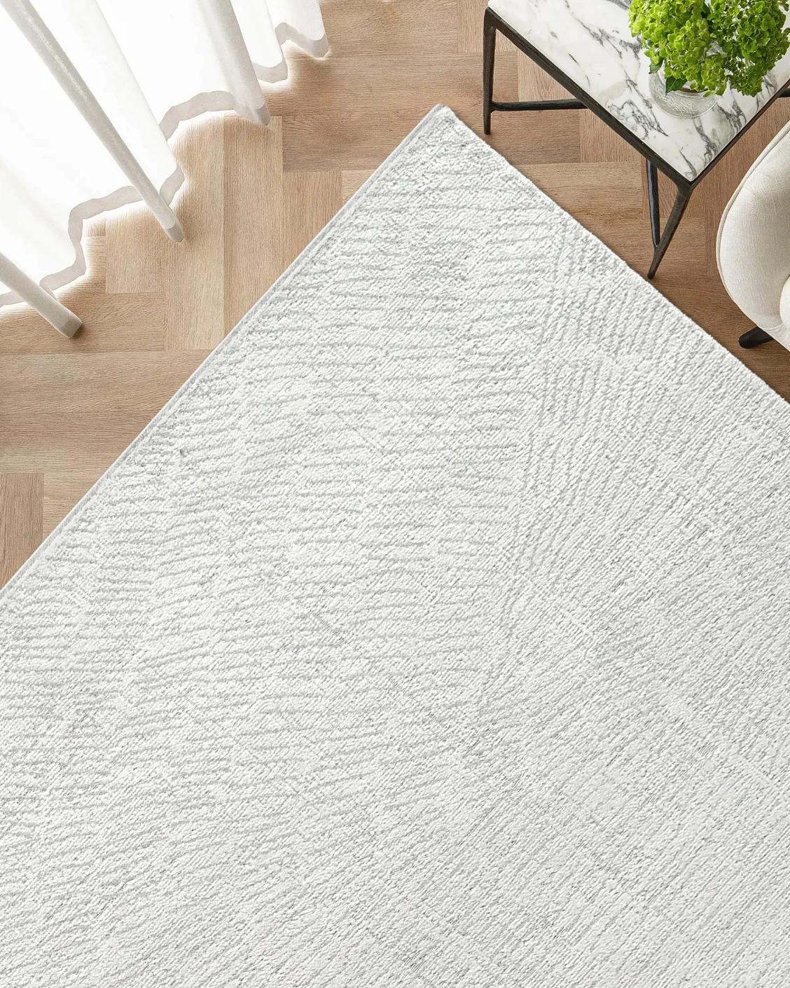 Link Sterling carpet in grey, shown in a lifestyle top view as image 2