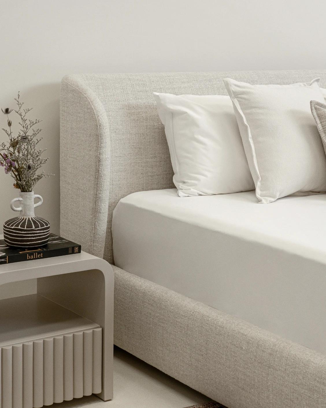 Livia Soft Off-White bed frame in off white, shown in a lifestyle left view as image 7