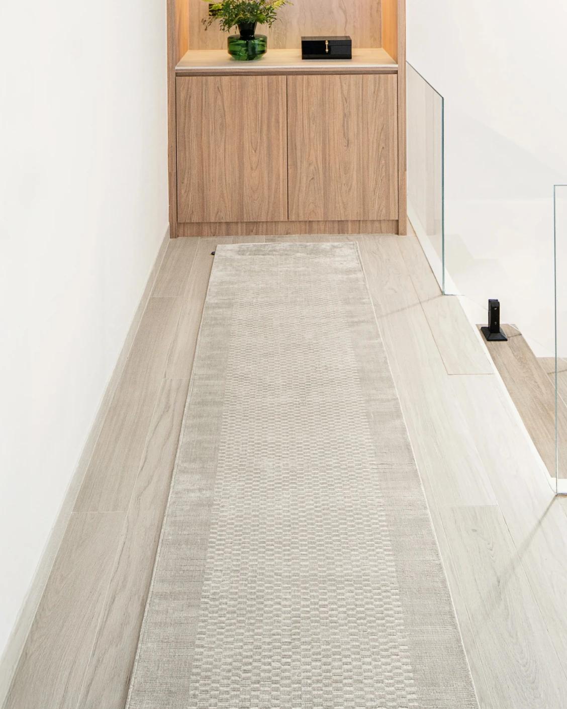 Luna Clay Runners carpet in beige, shown in a lifestyle front view