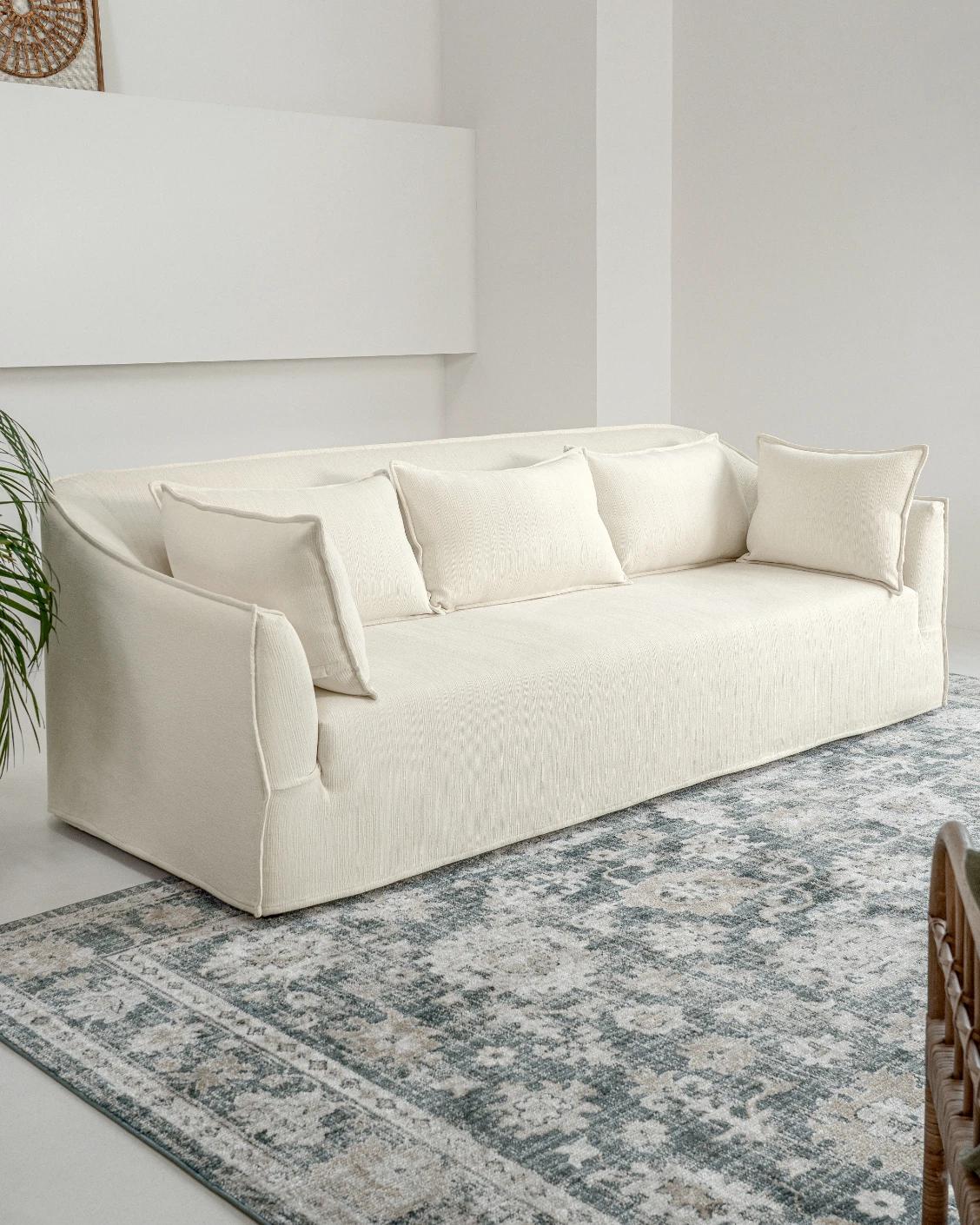 Miro Warm Ivory sofa, shown in a lifestyle left view as image 5