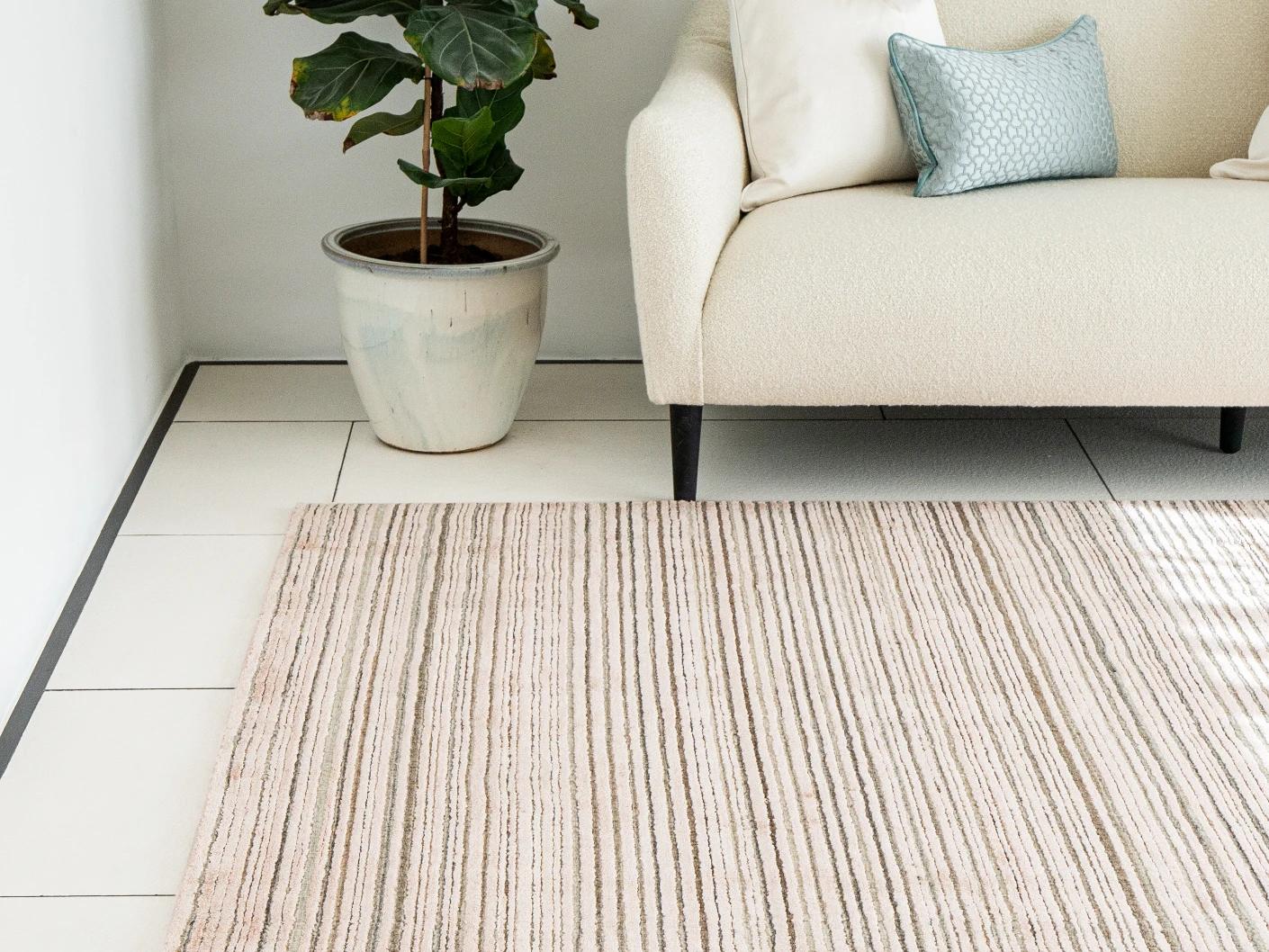 Rita Rosso carpets in pink, shown in a lifestyle front view as image 1