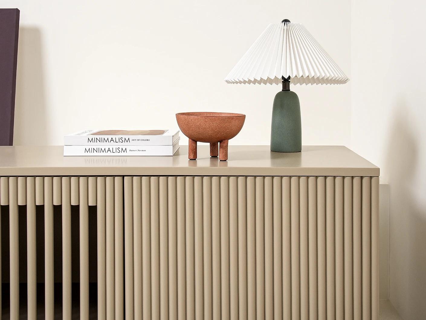 Treviso TV unit in warm clay and taupe, shown in a lifestyle front view as image 6