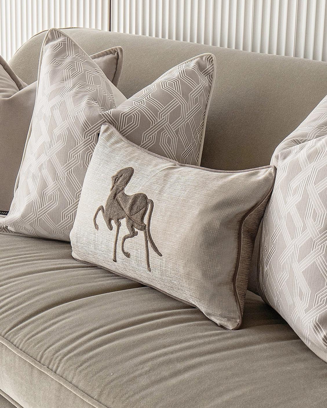 Sherwin Bundle cushion in beige, white and brown, shown in a product right view as image 5